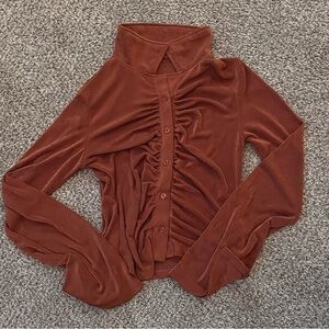 burnt orange 70s shirt